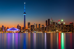 The lights on Toronto, Ontario reflecting off Lake Ontario